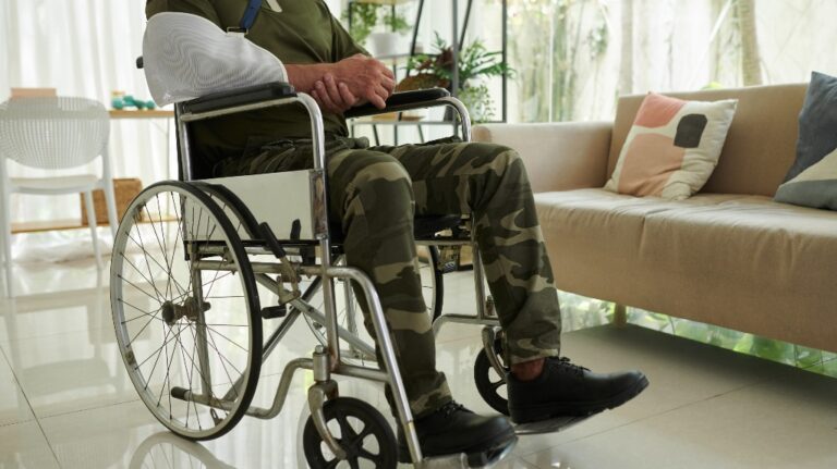 Soldier With Injured Arm In Wheelchair