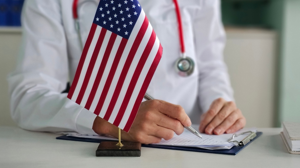 Doctor and American flag in the clinic concept